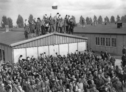 Dachauprisonerscelebratingtheirliberation4May1945.jpg