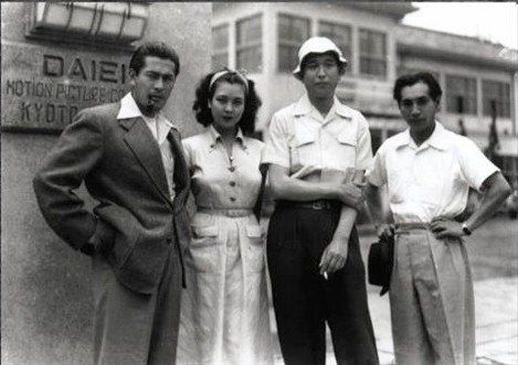 22_Toshiro Mifune Machiko Kyo Akira Kurosawa Masayuki Mori at Daiei Studios during the making of Rashomon 1950.jpg