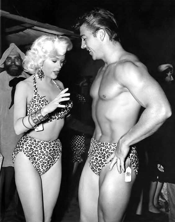 7 Jayne Mansfield and her fiance Mickey Hargitay (Mr. Universe 1955) do their scene-stealing adagio dance at a Hollywood Halloween party October 27th 1956..jpg