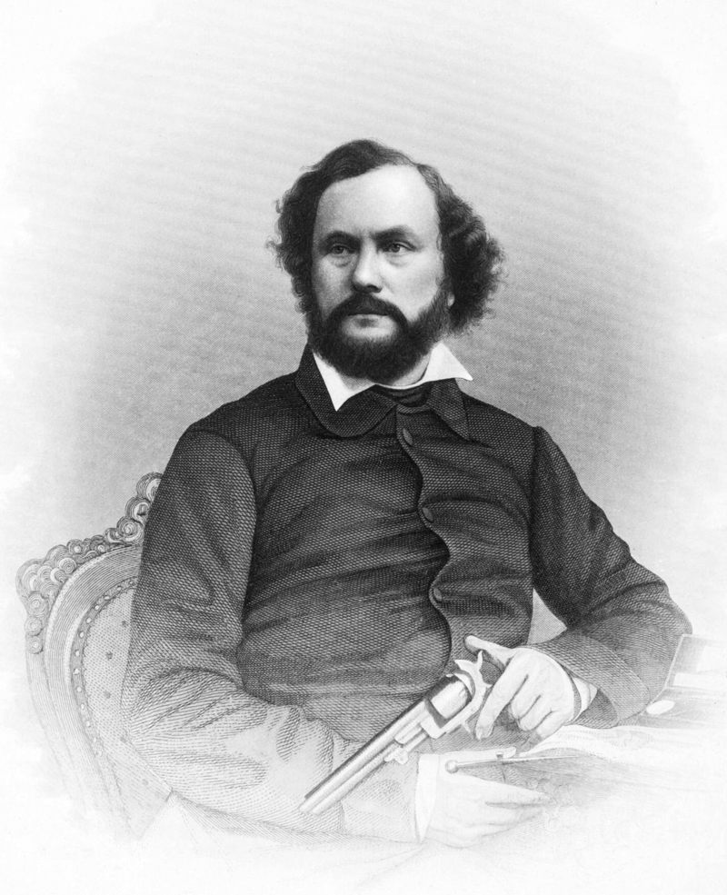 Сэмюэл Кольт с Colt Navy 1851 года.png